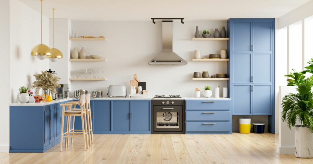 Aesthetic blue cabinets and wooden floors in a modern kitchen. Blue cabinets and wooden floors in a modern kitchen.