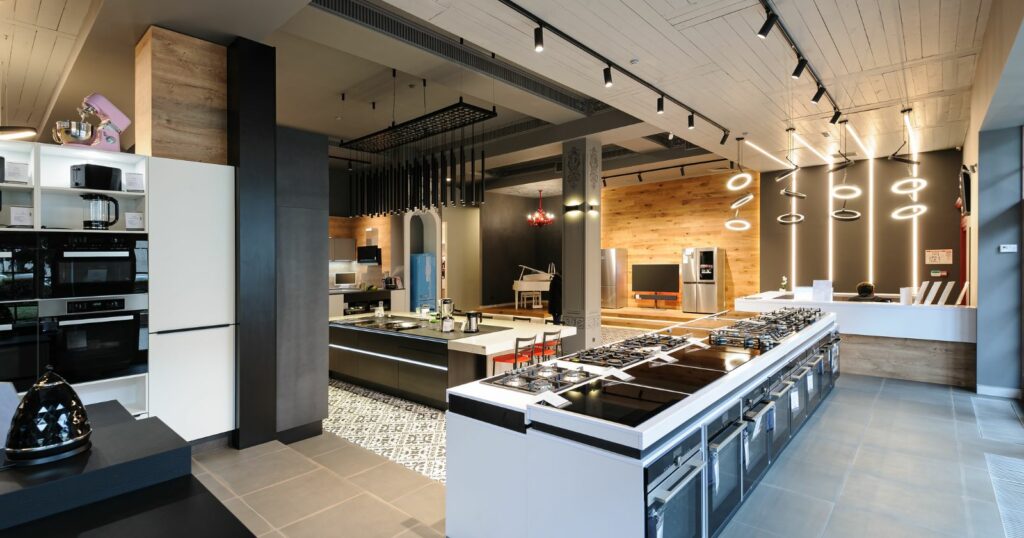 Modern kitchen with large island and eco-friendly appliances.