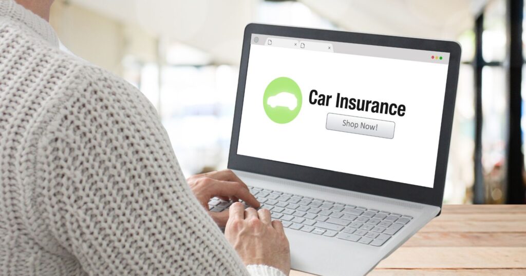 Laptop displaying car insurance website, illustrating the digital landscape for insurance companies.