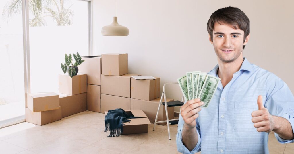 A man with money and a thumbs up in front of boxes, representing factors influencing how much to tip movers.