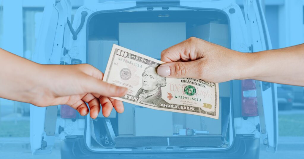 Two hands holding money towards a van, illustrating the concept of tipping.