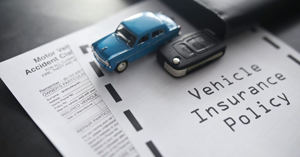 A close-up of a hand holding a policy document with the title "Understanding Your Policy" in bold letters.